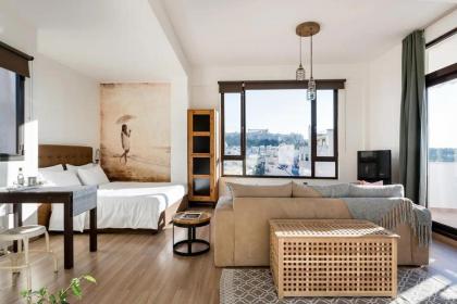 Explore Nightlife Near an Apartment With an Acropolis View