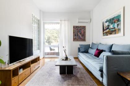 Adorable 2BD Apartment near Kallimarmaro Stadium by UPSTREET - image 2
