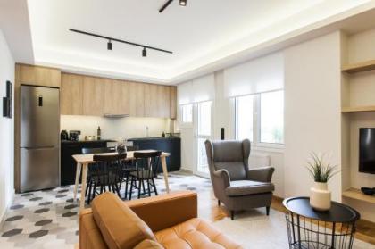 Modern Minimalist 3BD Apartment in Hilton District by UPSTREET - image 1