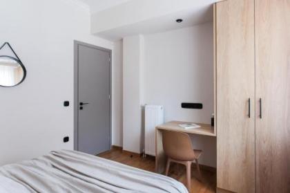Modern Minimalist 3BD Apartment in Hilton District by UPSTREET - image 15