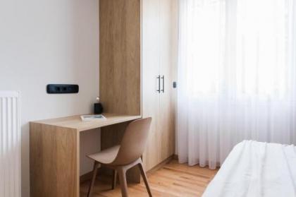 Modern Minimalist 3BD Apartment in Hilton District by UPSTREET - image 16