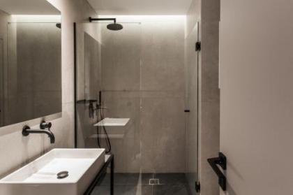 Modern Minimalist 3BD Apartment in Hilton District by UPSTREET - image 19