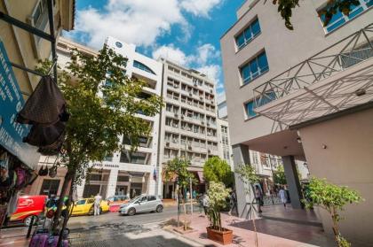 Designer renovated apartment in downtown Athens - image 19