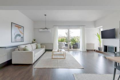 Panoramic 1BR Apartment near Kallimarmaro Stadium by UPSTREET Athens