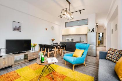 Sanders Home Suites - Cute Downtown One-Bedroom Apartment