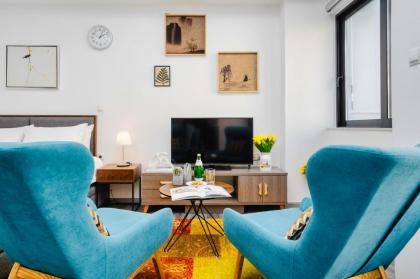 Sanders Home Suites - Petite Studio Apartment - image 20