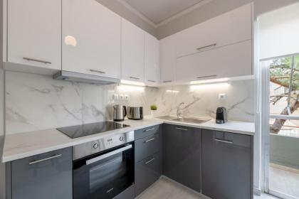 Smart Chic 1BR Apartment in Agia Paraskevi by UPSTREET - image 12