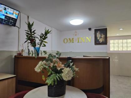 OM INN