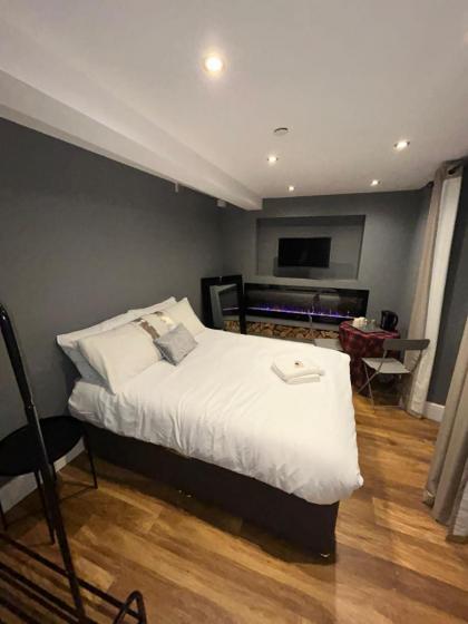 Cosy Double Bed With Fire Place 