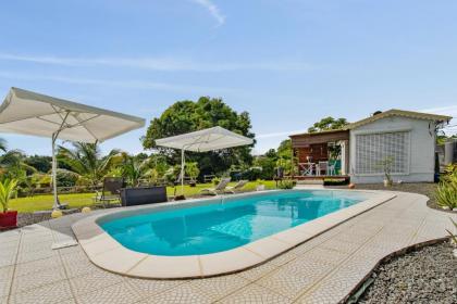 Bungalow d'une chambre avec piscine partagee jardin clos et wifi a Petit Bourg - image 4