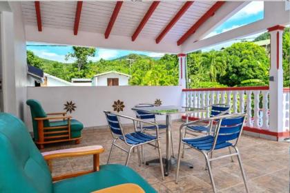 Maison de 2 chambres avec vue sur la mer terrasse amenagee et wifi a Vieux Habitants a 1 km de la plage - image 1