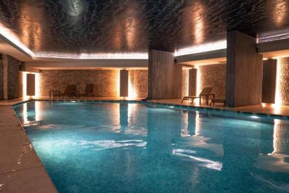 Sleek City Apartment With Premium Amenities - image 23