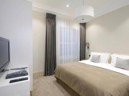 Stunning 1 Bed Luxury Serviced Apt Next To Harrods - image 5