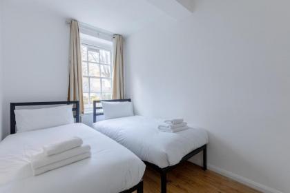 Inviting 2BD Flat 15 Minutes from Regents Park! - image 22