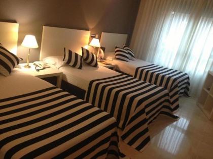 Esentia Togumar - Triple 3 adults Madrid