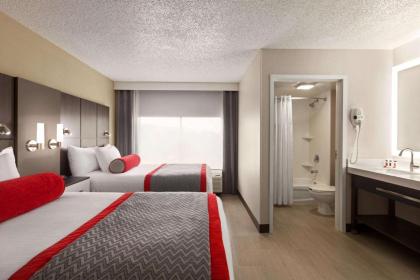 Ramada by Wyndham Suites Orlando Airport - image 29