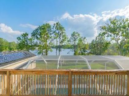 Reserve Relaxing 5 BR Pool Home Gated Lake View - image 16