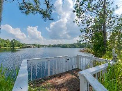 Reserve Relaxing 5 BR Pool Home Gated Lake View - image 19