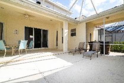 Stunning 5 Bd Home w/ Pool Close to Disney 7420 - image 10
