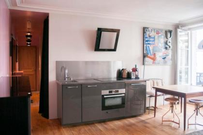 Cosy apartment near the Palais Garnier - image 5