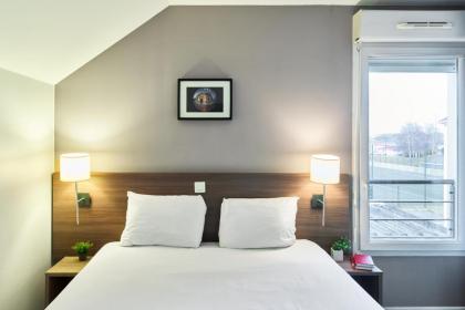 Zenitude Hotel Residences Roissy Village - image 17