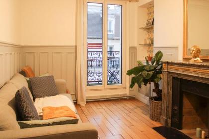 Spacious and practical apartment in Paris 18th - image 16