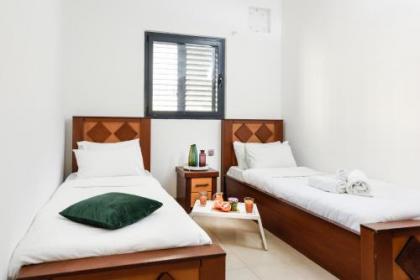 Stunning 2BR Apt w Balcony in City Center by Sea N' Rent - image 20
