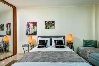 Superb Beachfront Apartments with Pool by Sea N' Rent - image 13