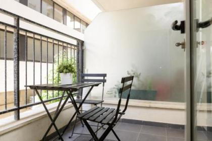 Classic 1BR in City Center near Beach by FeelHome - image 1