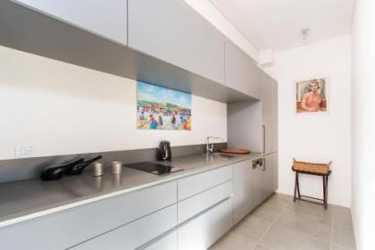 Bright 1BR Apartment w Balcony & Mamad 10 min Walk from Beach by Sea N' Rent - image 15