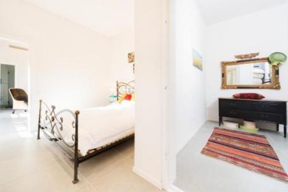 Bright 1BR Apartment w Balcony & Mamad 10 min Walk from Beach by Sea N' Rent - image 17
