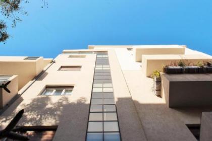 Bright 1BR Apartment w Balcony & Mamad 10 min Walk from Beach by Sea N' Rent - image 5