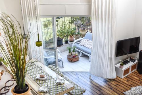 TLV Loft Paradise with Balcony Roof Top & Mamad by Sea N' Rent - image 2