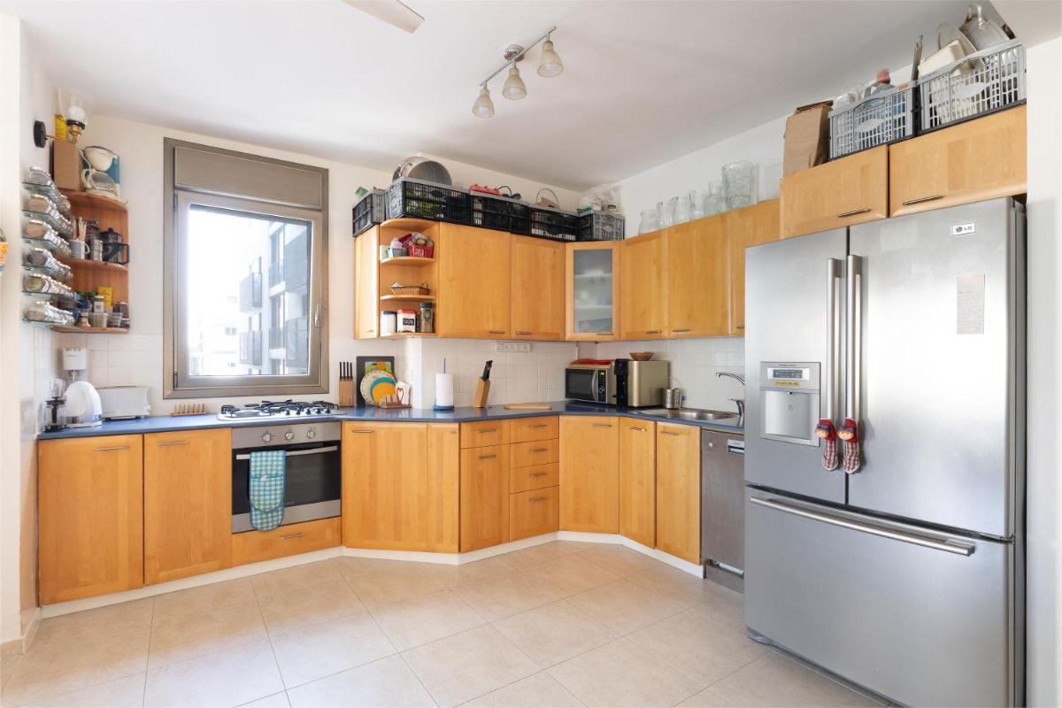 Cozy 3BR Apt w Big Windows 5 Min Walk From Beach by Sea N' Rent - image 2