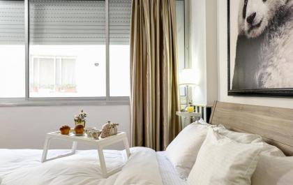 Stylish 3BR Apt w Balcony 5 min Walk from Beach by Sea N' Rent - image 16