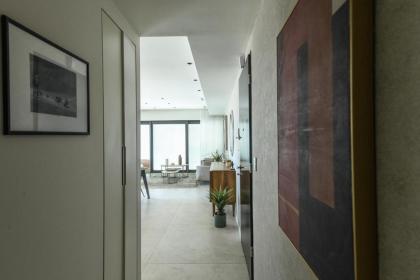 Luxury 3BR Apt w Sea View 5-min From the Beach by Sea N' Rent - image 13
