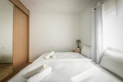 Chic Apartment w Balcony Mamad & Parking 3-min from Beach by Sea N' Rent - image 16