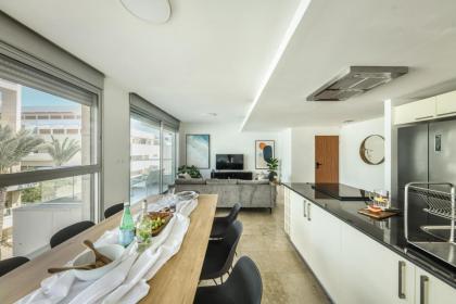 Chic Apartment w Balcony Mamad & Parking 3-min from Beach by Sea N' Rent - image 20