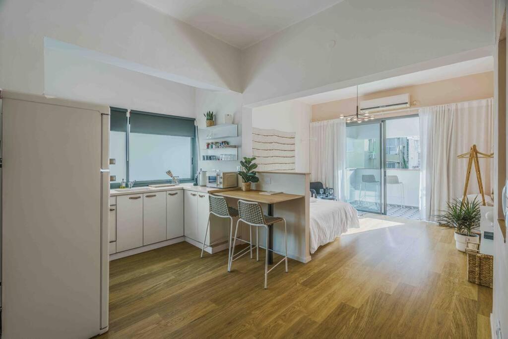 A designed loft by the sea with a balcony - main image