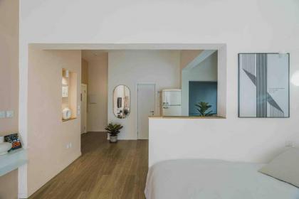 A designed loft by the sea with a balcony - image 11