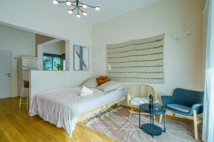 A designed loft by the sea with a balcony - image 4