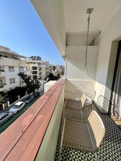 A designed loft by the sea with a balcony - image 6