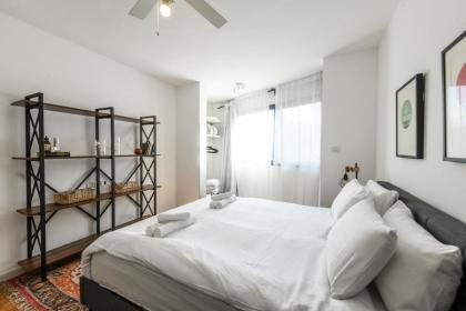 Chic 3BR Apt w Balcony & Parking by Tel Aviv Port by Sea N' Rent - image 10