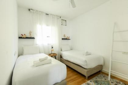 Chic 3BR Apt w Balcony & Parking by Tel Aviv Port by Sea N' Rent - image 14