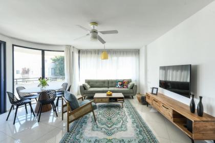 Chic 3BR Apt w Balcony & Parking by Tel Aviv Port by Sea N' Rent - image 18