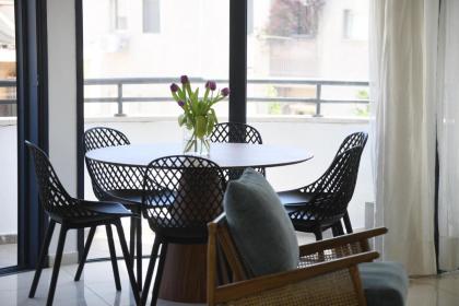 Chic 3BR Apt w Balcony & Parking by Tel Aviv Port by Sea N' Rent - image 9