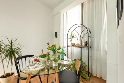 Cozy 2BR Apt w Green Oasis a 3 Min Walk from Beach by Sea N' Rent - image 19