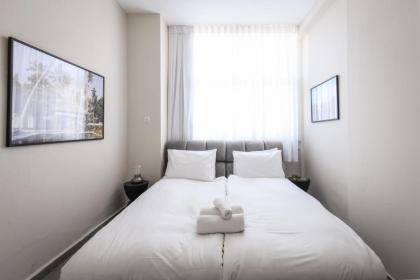 Spacious & Bright 3BR Apt Near the Beach & Port by Sea N' Rent - image 16