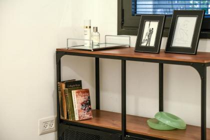 Stylish 2BR Apt with Patio in the Heart of Tel Aviv by Sea N' Rent - image 11