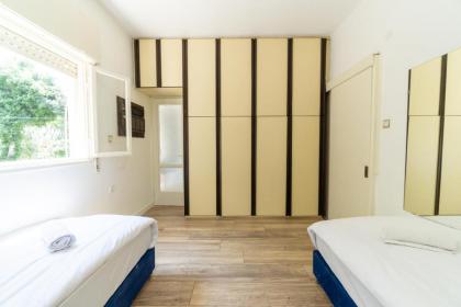 Spacious 3BR Surrounded by Greenery - image 7